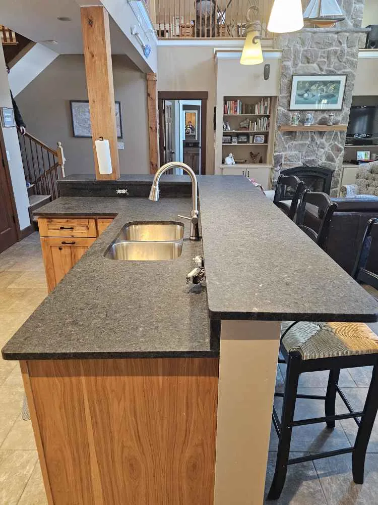 Raised bar top, leathered Black Pearl granite