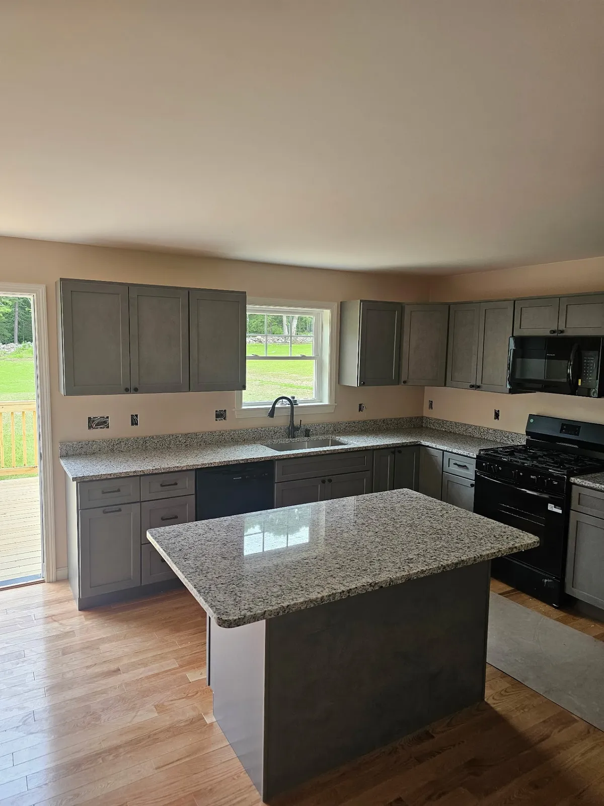 Granite island with existing gray cabinets