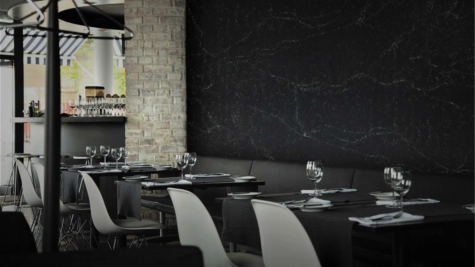 HanStone Quartz dark full-slab commercial wall installation