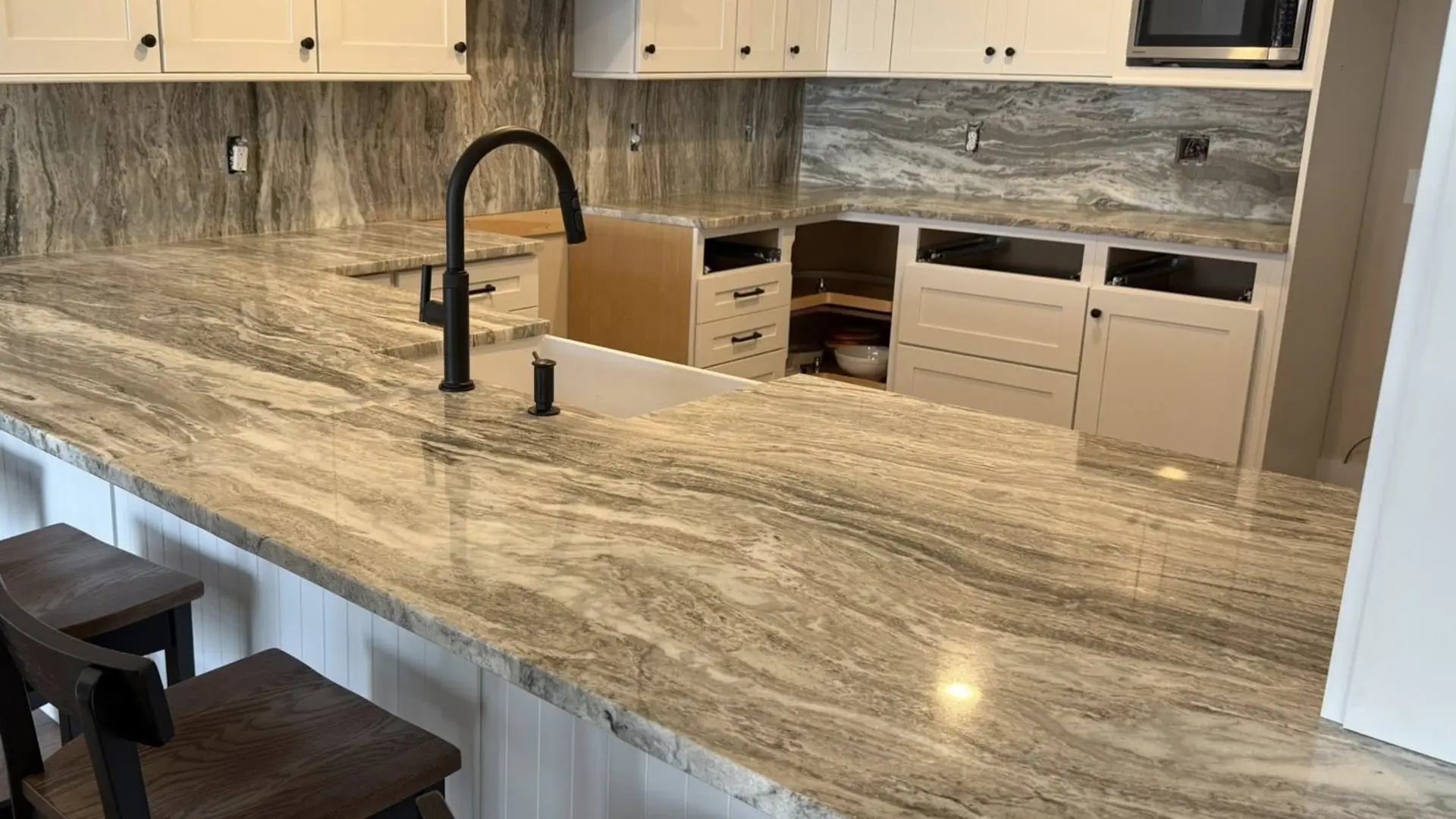 Custom granite peninsula kitchen countertop