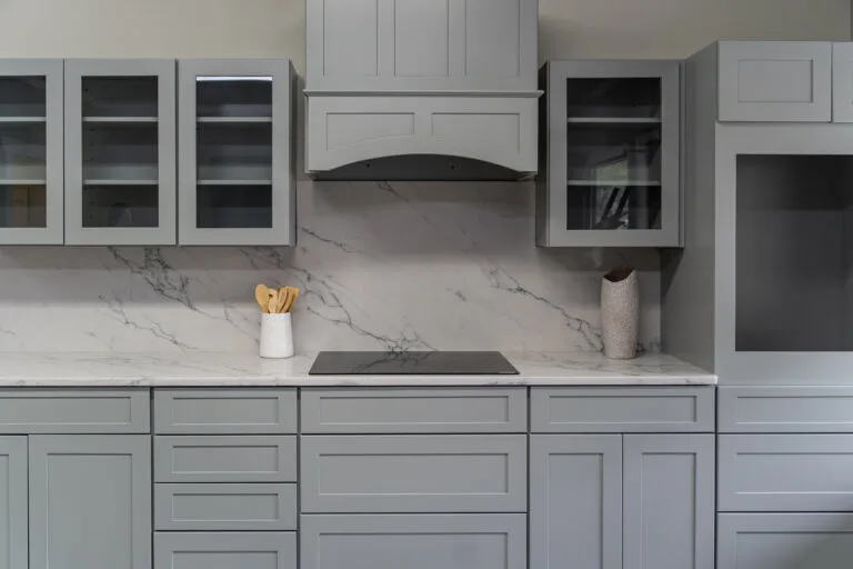 Marble backsplash, gray cabinets