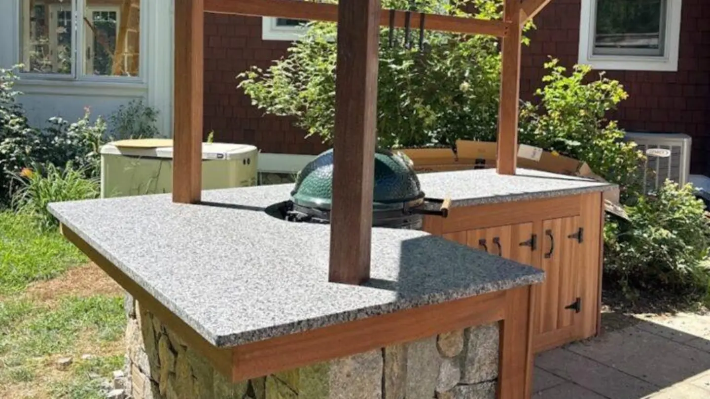 Outdoor kitchen, granite counter & stone base