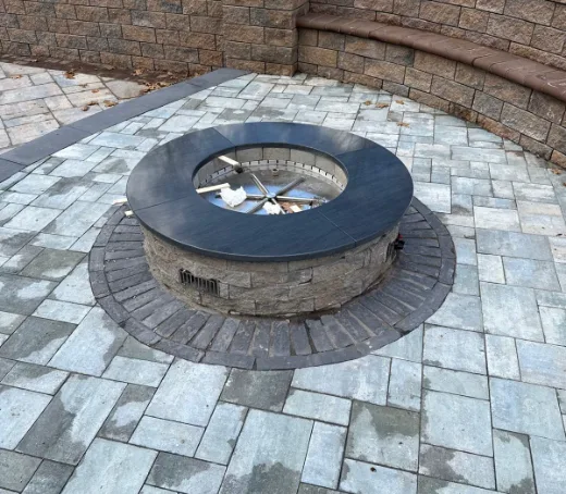 Outdoor firepit with granite cap