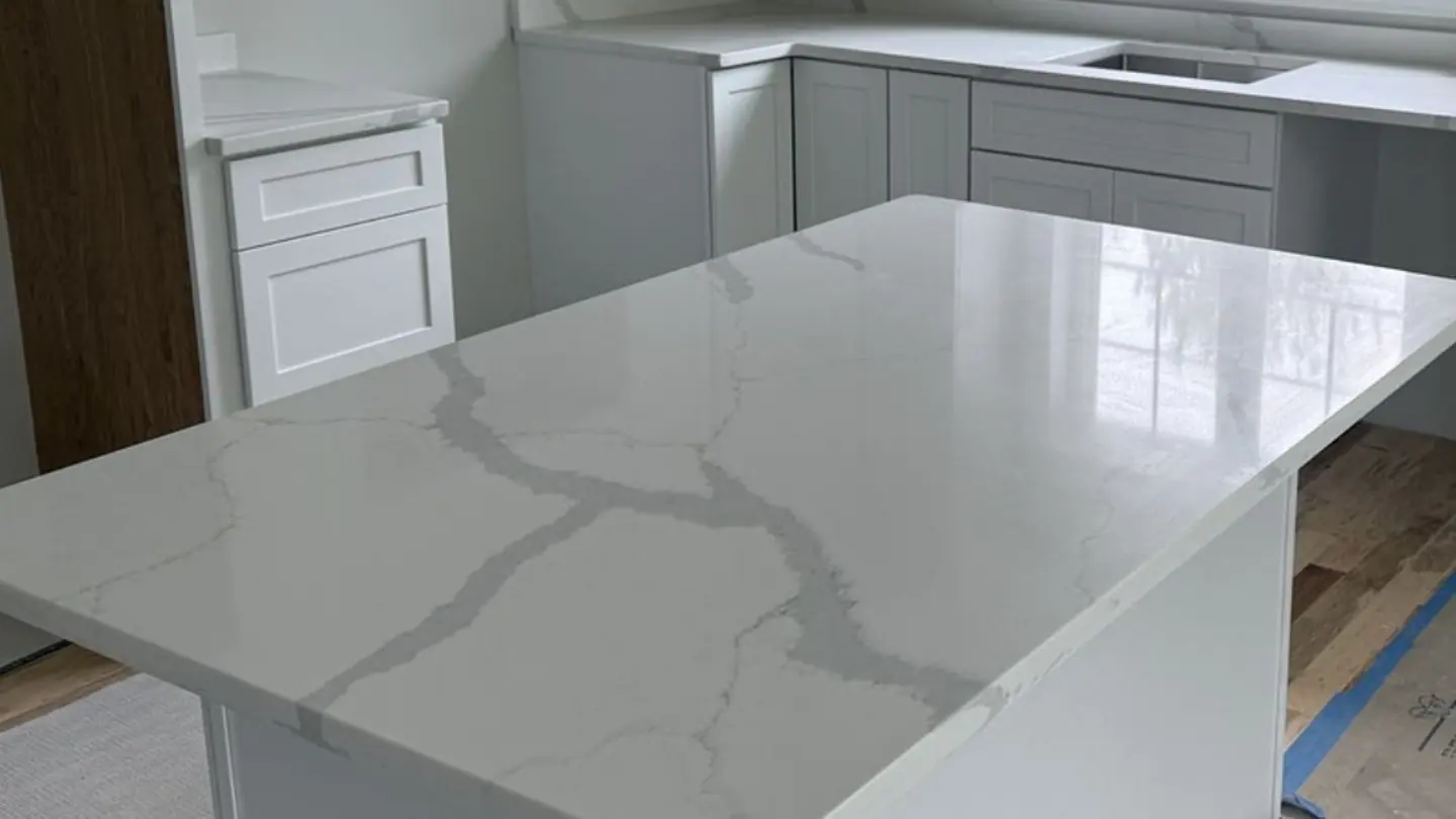 Calacatta-veined quartz island