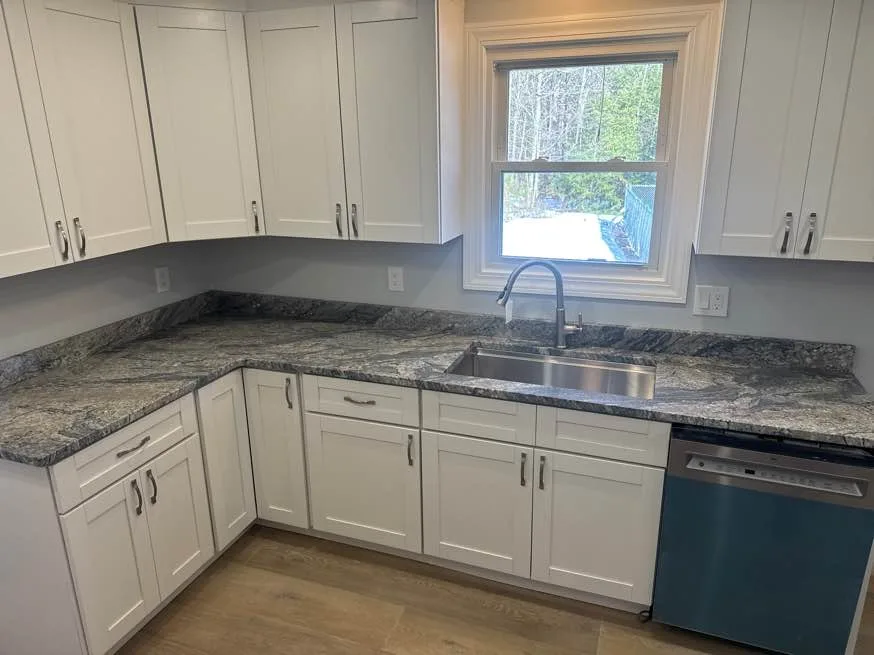 White Wave granite kitchen